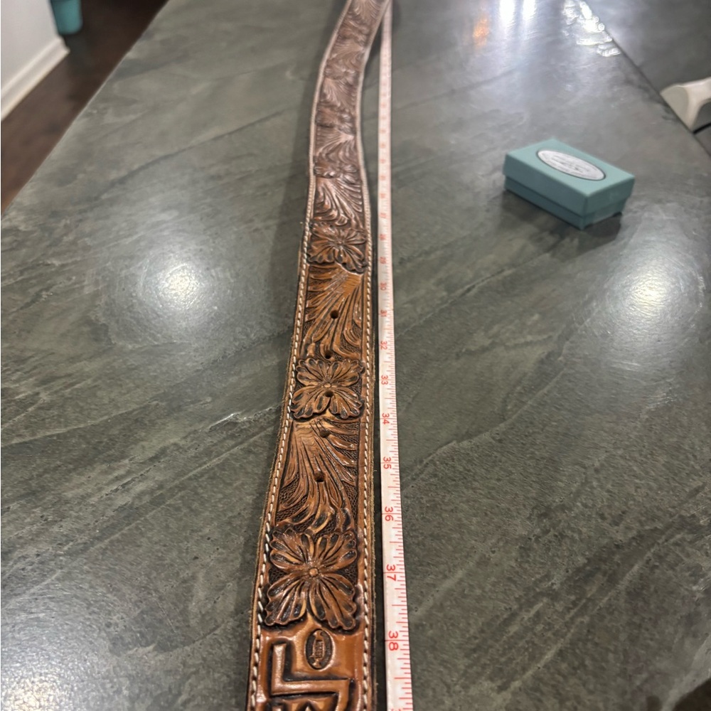 Custom belt and buckle set with brand. Floral tooled Leather Belt